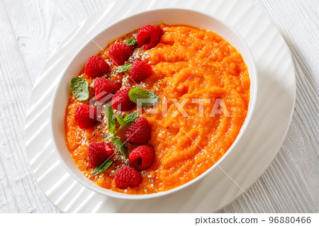 Sweet Potato Mash topped with fresh Raspberries Sweet Potato Mash topped with fresh Raspberries 96880466