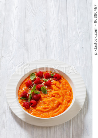 Sweet Potato Mash topped with fresh Raspberries Sweet Potato Mash topped with fresh Raspberries 96880467