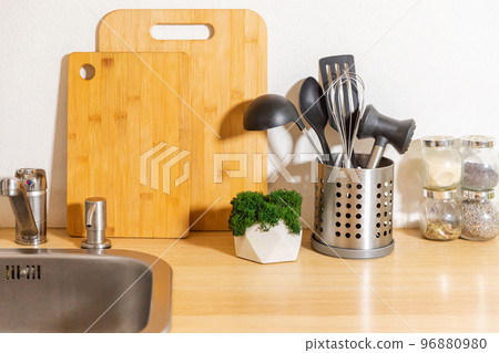 Scandinavian classic minimalistic kitchen with white and wooden details. Modern white kitchen clean contemporary style interior design. 96880980