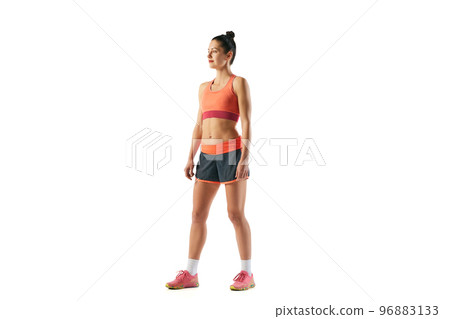 One sportive girl in sports uniform isolated over white background. Concept of sport, beauty, action, achievements, hobbies One sportive girl in sports uniform isolated over white background. Concept of sport, beauty, action, achievements, hobbies 96883133