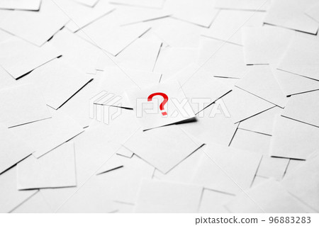 Pile of blank pieces of paper with red question mark in the middle Pile of blank pieces of paper with red question mark in the middle 96883283