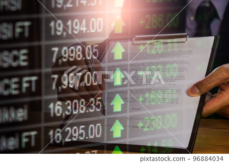Stock market or forex trading graph and candlestick chart suitable for financial investment concept. Economy trends background for business idea and all art work design. Abstract finance background.. Stock market or forex trading graph and candlestick chart suitable for financial investment concept. Economy trends background for business idea and all art work design. Abstract finance background.. 96884034