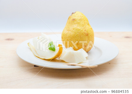 Silver Bell Cut pears served on a plate Silver Bell Cut pears served on a plate 96884535