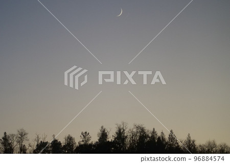 sunset with crescent moon sunset with crescent moon 96884574