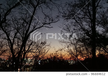 sunset with crescent moon sunset with crescent moon 96884612