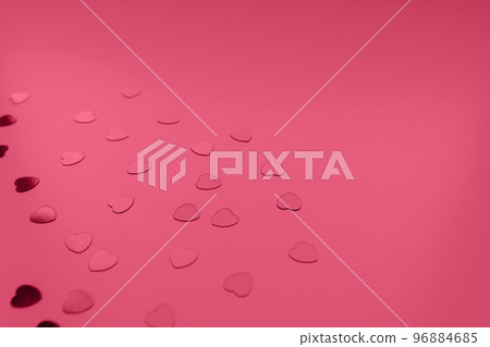 Red hearts confetti on festive background in color of the year 2023 Viva Magenta. Love, dating and St Valentines Day concept. Selective focus, copy space Red hearts confetti on festive background in color of the year 2023 Viva Magenta. Love, dating and St Valentines Day concept. Selective focus, copy space 96884685