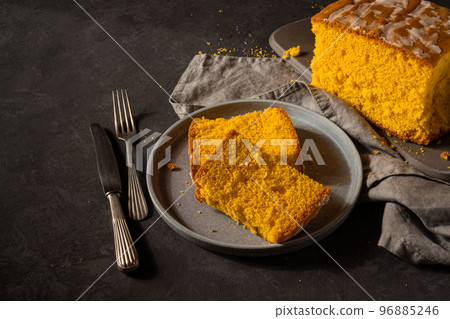 Typical spongecake of Portugal on dark background 96885246