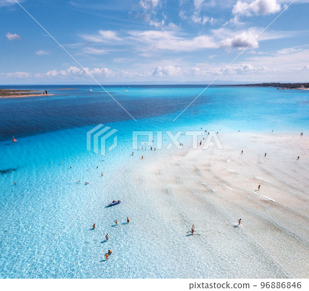 Aerial view of amazing sea coast. Top view of white sandy beach Aerial view of amazing sea coast. Top view of white sandy beach 96886846