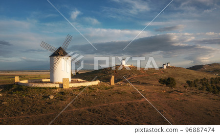 Windmills. These iconic towers over their skylines of la Mancha. Windmills. These iconic towers over their skylines of la Mancha. 96887474