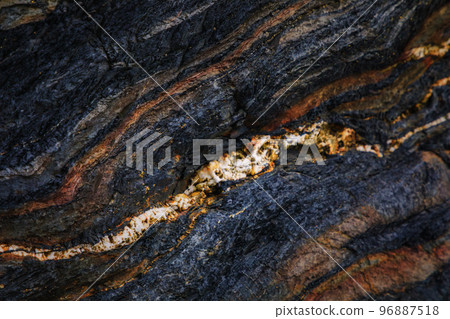 Rocky shapes on the beach. textures and patterns generated on the stones of the Asturian beaches Rocky shapes on the beach. textures and patterns generated on the stones of the Asturian beaches 96887518
