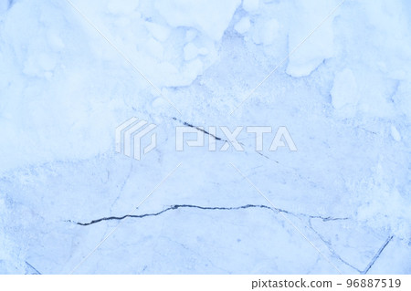 Winter ice frost, frozen marble floor background. The texture is a matte blue marble surface with pieces of snow. A piece of cracked snow. High quality photo 96887519