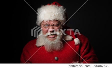 Santa Claus looking into the camera Santa Claus looking into the camera 96887870