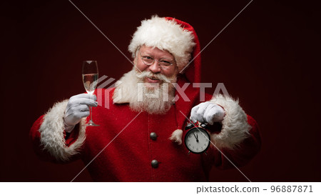 Santa claus with alarm clock 96887871