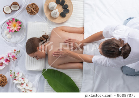 Woman at spa thai massage Woman at spa thai massage 96887873