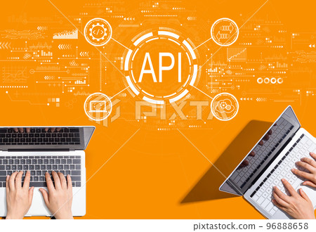 API - application programming interface concept with people working together API - application programming interface concept with people working together 96888658