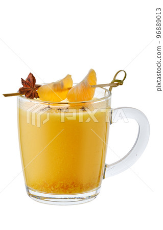 Spicy hot drink made of tangerines with anise flavor Spicy hot drink made of tangerines with anise flavor 96889013