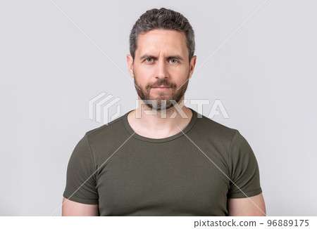 portrait of caucasian man with stubble isolated on grey background. caucasian man with stubble portrait of caucasian man with stubble isolated on grey background. caucasian man with stubble 96889175
