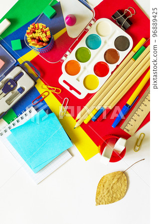 Office supplies and stationery isolate on a white background. Top view flat lay background, copy space. Office supplies and stationery isolate on a white background. Top view flat lay background, copy space. 96889425
