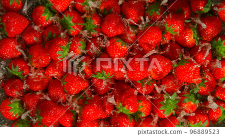 Freeze Motion Shot of Splashing Fresh Strawberries, Close-up. Freeze Motion Shot of Splashing Fresh Strawberries, Close-up. 96889523