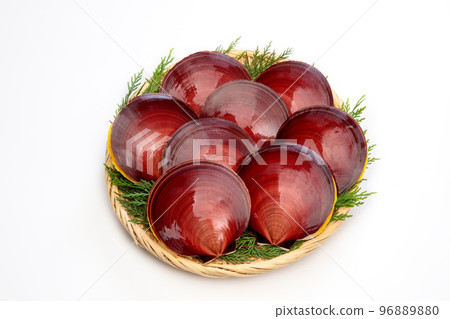 Red mussels piled up in a bamboo colander Red mussels piled up in a bamboo colander 96889880