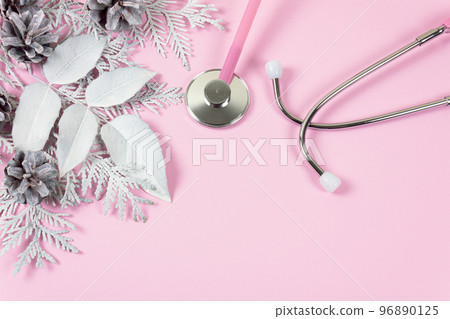 Stethoscope and Christmas decorations. Medical concept. Greeting card. New Year and Christmas. Stethoscope and Christmas decorations. Medical concept. Greeting card. New Year and Christmas. 96890125