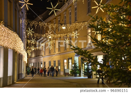 Beautiful Christmas decorations on Herrengasse street, at night, in the city center of Graz, Styria region, Austria 96890151