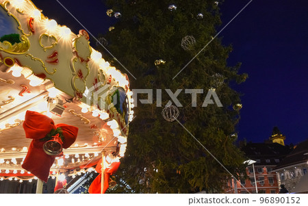 Vintage carousel and beautiful Christmas decorations at night, in the city center of Graz, Styria region, Austria Vintage carousel and beautiful Christmas decorations at night, in the city center of Graz, Styria region, Austria 96890152