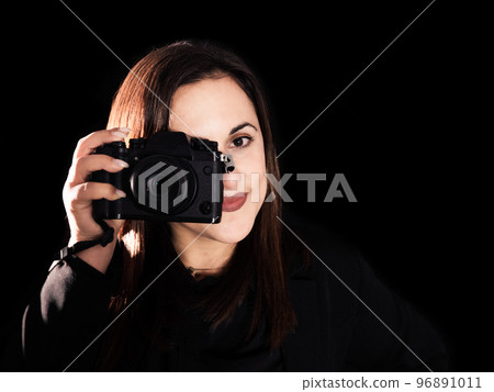 woman photographer close up camera black background  96891011