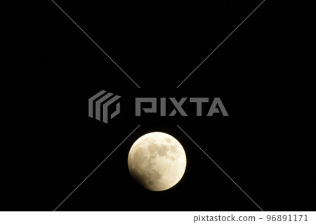 Hakushu-cho, Hokuto City, full moon starting to chip from the lower left due to a lunar eclipse (position: lower center) Hakushu-cho, Hokuto City, full moon starting to chip from the lower left due to a lunar eclipse (position: lower center) 96891171