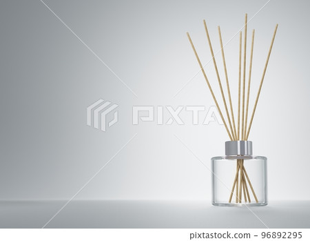 Aroma diffuser clear glass bottle with silver cap and wooden sticks 3D render Aroma diffuser clear glass bottle with silver cap and wooden sticks 3D render 96892295