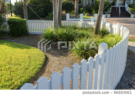 Destin, Florida- Painted white picket fence with curved corner 96893061