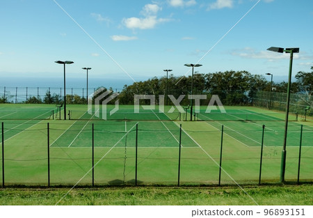 Outdoor tennis court with artificial turf 96893151