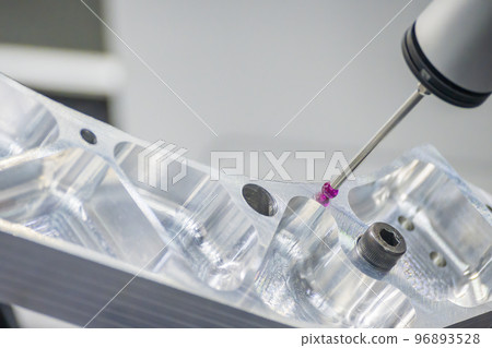The multi-axis CMM machine measuring the aluminum parts. The multi-axis CMM machine measuring the aluminum parts. 96893528