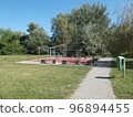 Playground equipment in the park on a sunny afternoon 96894455