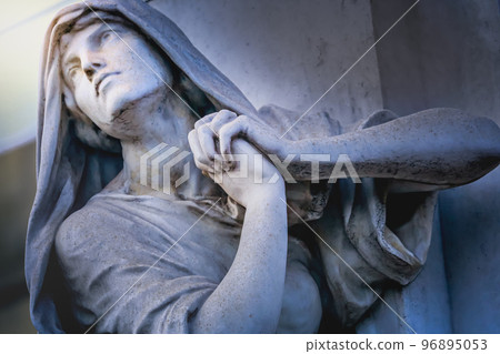 Faithfull Virgin Mary with praying hands and blessing, looking at the sky 96895053
