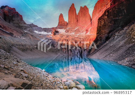 Torres Del Paine granites at sunrise and lake reflection, Chilean Patagonia 96895317