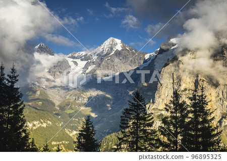 Eiger and Monch, Snowcapped Bernese Swiss alps, view from Murren, Switzerland 96895325