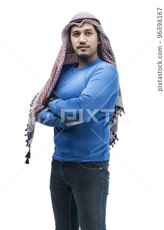 Asian man wearing keffiyeh standing with folded arms 96898167