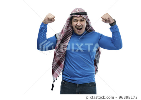 Asian man with keffiyeh standing with excited expression 96898172