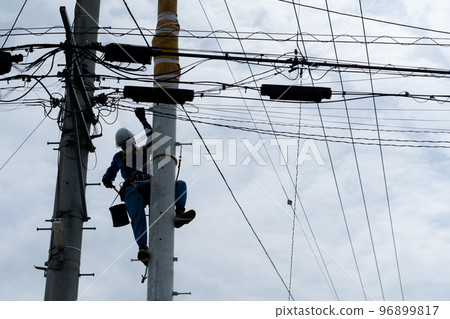 Electric pole installation work 96899817