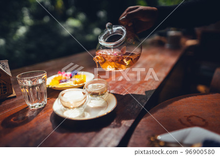 flower tea,Tea set on the terrace, natural background 96900580