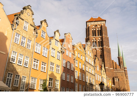 Gothic Bazylika Mariacka church Saint Mary cathedral in City hall Ancient architecture of old town in Gdansk Poland. Beautiful and colorful old houses historical part of downtown 96900777
