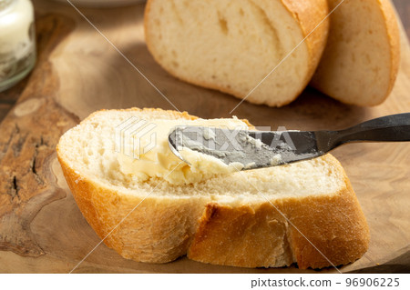 put butter on bread put butter on bread 96906225