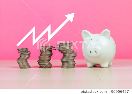 White piggy bank and stack money coins with growing graph on pink background, White piggy bank and stack money coins with growing graph on pink background, 96906457