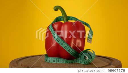The Red pepper and measurement tape The Red pepper and measurement tape 96907276
