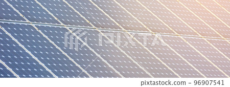 Close up of solar panels outside, alternative green energy, a renewable energy source Close up of solar panels outside, alternative green energy, a renewable energy source 96907541