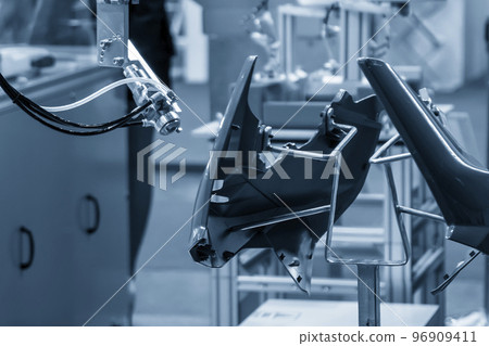 The high technology automotive paint work with painting robot. The high technology automotive paint work with painting robot. 96909411