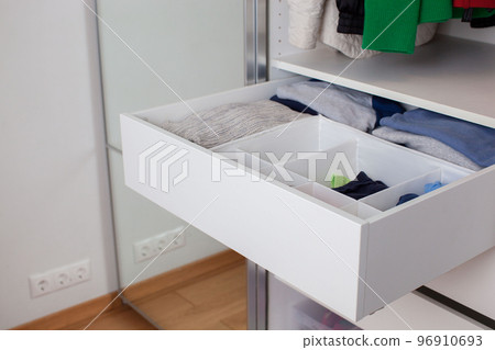 Vertical clothing storage ideas. Vertical clothing storage ideas. 96910693