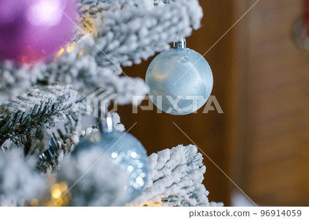 Christmas tree with a blue ball 96914059