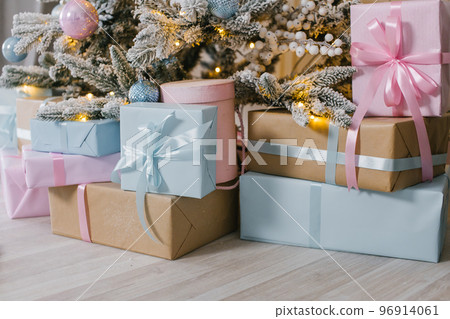 Christmas gifts blue and pink under the Christmas tree Christmas gifts blue and pink under the Christmas tree 96914061